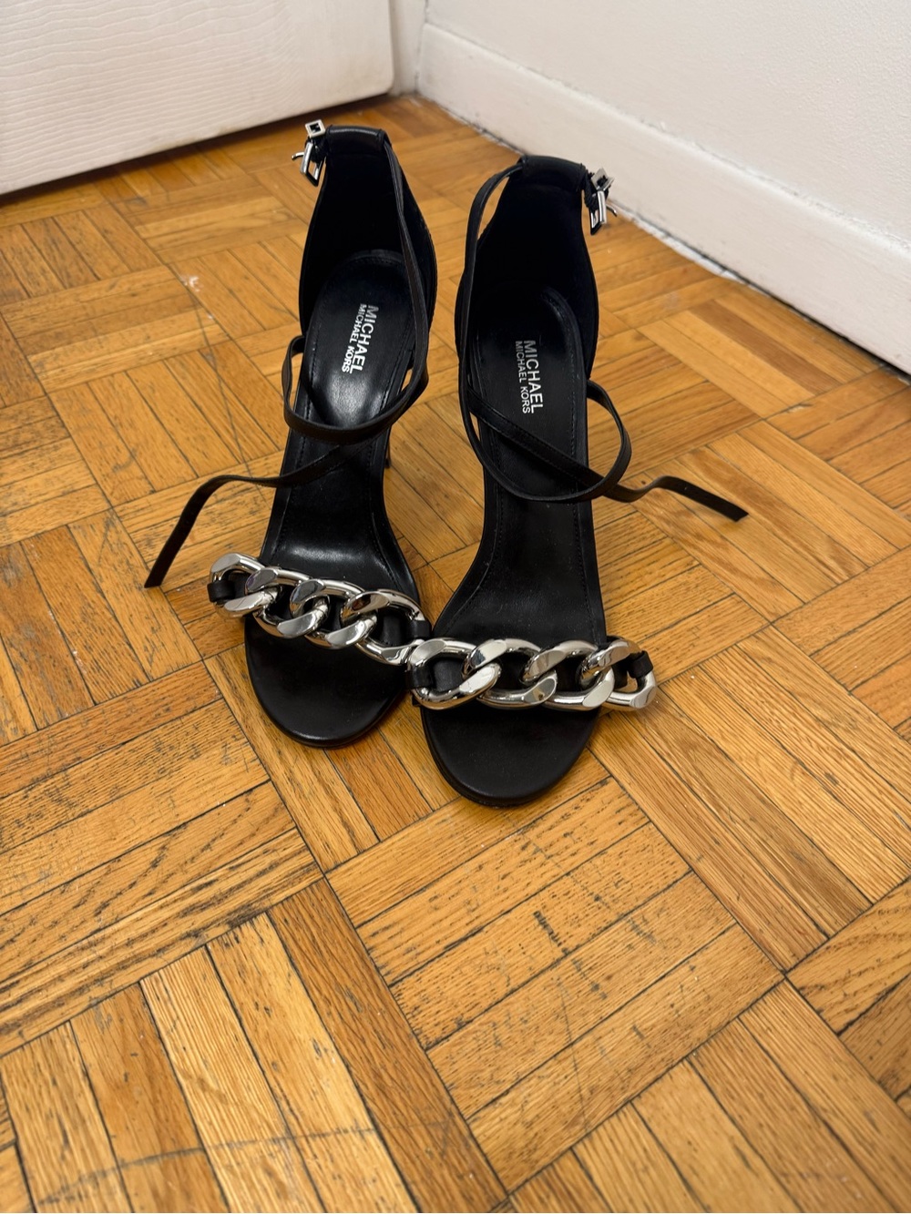 MICHAEL Michael Kors Black Sandals with Silver Chain Accent